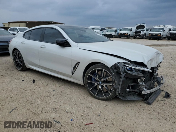 2023 BMW 8 Series M850i z VIN WBAGV8C01PCK29190, wystawiony jako Copart lot #47189205 z przebiegiem 32 691 mil mil oraz Szkoda całkowita • Salvage title. Historia ofert i sprzedaży dostępna na DreamBid. Obrazek 4.