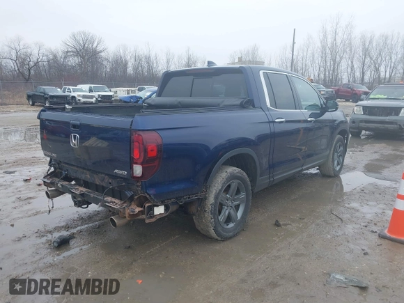 2022 Honda Ridgeline RTL-E with VIN 5FPYK3F72NB036226, listed as a IAAI auction lot 41706285 with 30,869 mi miles and . Bid and sale history available at DreamBid. Image 4.