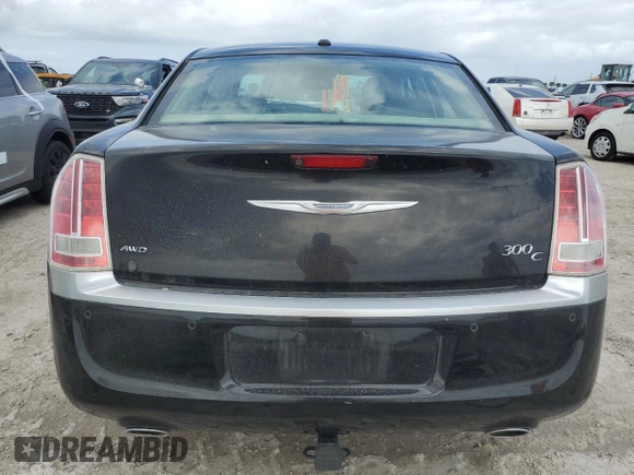 2013 Chrysler 300 Luxury Series with VIN 2C3CCASG7DH534199, listed as a Copart auction lot 75991324 with Not Provided miles and Salvage Title. Bid and sale history available at DreamBid. Image 6.