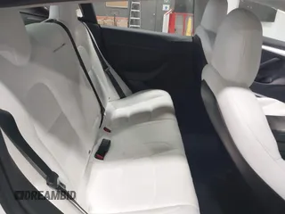 2021 Tesla Model 3 Long Range with VIN 5YJ3E1EBXMF051060, listed as a IAAI auction lot 41958018 with 65,631 mi miles. Bid and sale history available at carsss.com. Image 8.