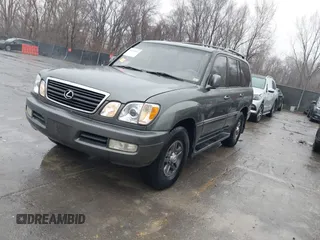 2002 Lexus LX 470 with VIN JTJHT00W923515897, listed as a IAAI auction lot 41155492 with 244,619 mi miles. Bid and sale history available at carsss.com. Image 17.