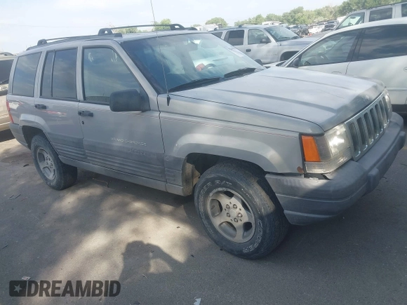1998 Jeep Grand Cherokee Laredo with VIN 1J4GZ58S6WC319265, listed as a IAAI auction lot 42619853 with 238,667 mi miles and . Bid and sale history available at DreamBid. Image 1.