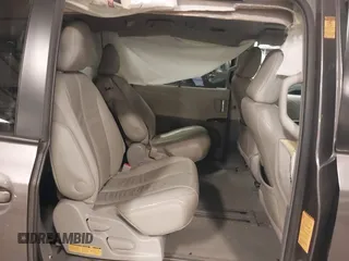 2013 Toyota Sienna XLE AAS z VIN 5TDYK3DC6DS386235, wystawiony jako IAAI lot #42191706 z przebiegiem 144 328 mil mil oraz . Historia ofert i sprzedaży dostępna na DreamBid. Obrazek 8.