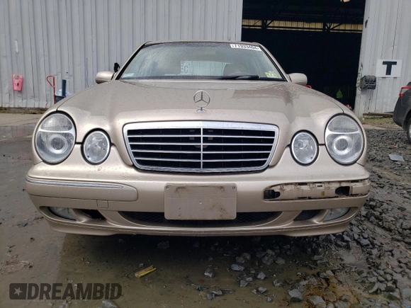 2001 Mercedes-Benz E-Class with VIN WDBJF65J01B389296, listed as a Copart auction lot 71933404 with 124,392 mi miles and Salvage Title. Bid and sale history available at carsss.com. Image 5.
