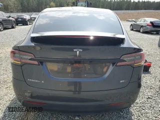 2016 Tesla Model X 70D z VIN 5YJXCBE23GF005295, wystawiony jako Copart lot #51034005 z przebiegiem 130 325 mil mil oraz Szkody całkowita. Historia ofert i sprzedaży dostępna na DreamBid. Obrazek 6.
