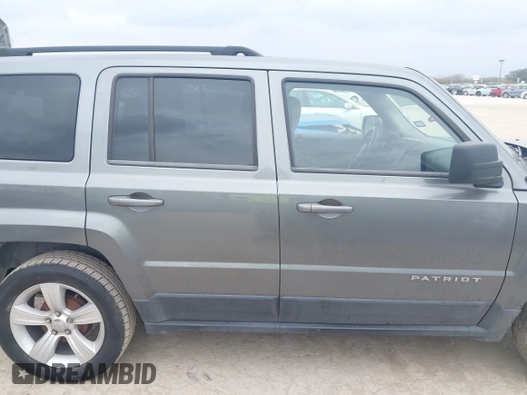 2014 Jeep Patriot Latitude with VIN 1C4NJPFAXED507693, listed as a IAAI auction lot 41701193 with 104,130 mi miles and . Bid and sale history available at DreamBid. Image 13.