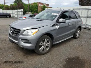 2014 Mercedes-Benz M 350 with VIN 4JGDA5HB3EA371507, listed as a Copart auction lot 59573185 with 149,338 mi miles and Salvage title. Bid and sale history available at DreamBid. Image 1.