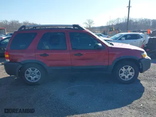 2005 Ford Escape XLT with VIN 1FMCU93115KB29320, listed as a IAAI auction lot 41768208 with 162,047 mi miles. Bid and sale history available at carsss.com. Image 13.