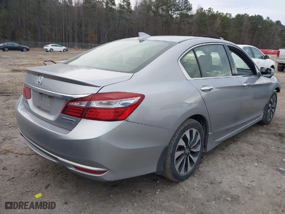 2017 Honda Accord Hybrid Touring with VIN JHMCR6F75HC016374, listed as a IAAI auction lot 41468778 with 180,618 mi miles. Bid and sale history available at carsss.com. Image 4.
