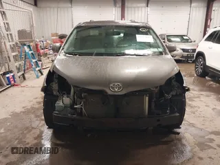 2011 Toyota Sienna LE with VIN 5TDJK3DC2BS013045, listed as a IAAI auction lot 41127037 with 239,401 mi miles. Bid and sale history available at carsss.com. Image 13.