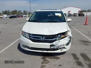 2016 Honda Odyssey Touring Elite with VIN 5FNRL5H97GB044278, listed as a IAAI auction lot 42056101 with 182,396 mi miles and . Bid and sale history available at DreamBid. Image 12.