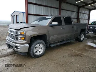 2015 Chevrolet Silverado 1500 LT with VIN 1GCUKREC5FF199913, listed as a Copart auction lot 58476584 with 129,616 mi miles and Salvage Title. Bid and sale history available at DreamBid. Image 1.