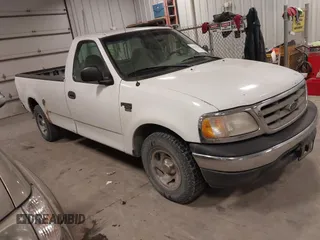 2000 Ford F-150 XL with VIN 1FTRF17W8YKB33949, listed as a IAAI auction lot 41519978 with 228,931 mi miles. Bid and sale history available at carsss.com. Image 1.