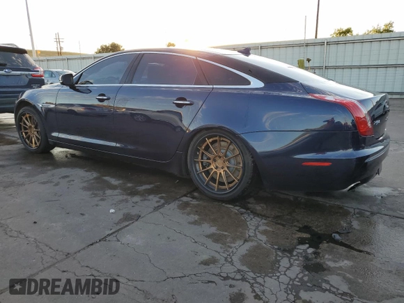 2015 Jaguar XJ with VIN SAJWA2GT2FMV90837, listed as a Copart auction lot 71126294 with 92,973 mi miles and Clean Title. Bid and sale history available at DreamBid. Image 2.