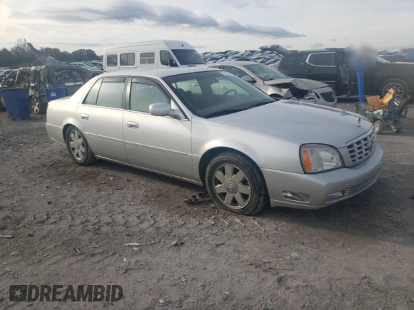 2003 Cadillac DeVille DTS z VIN 1G6KF57973U163124, wystawiony jako Copart lot #78054584 z przebiegiem 111 189 mil mil oraz Szkoda całkowita • Salvage title. Historia ofert i sprzedaży dostępna na DreamBid. Obrazek 4.