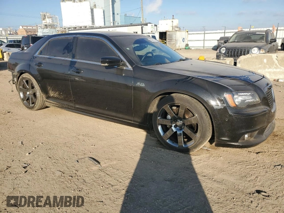 2013 Chrysler 300 SRT-8 with VIN 2C3CCAFJ8DH646483, listed as a Copart auction lot 83261144 with 86,015 mi miles and Salvage Title. Bid and sale history available at DreamBid. Image 4.