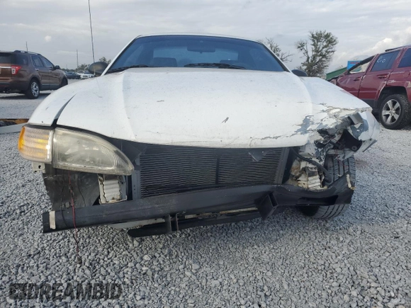 1997 Ford Mustang with VIN 1FALP4044VF174876, listed as a Copart auction lot 41601355 with 103,828 mi miles and Salvage Title. Bid and sale history available at carsss.com. Image 5.