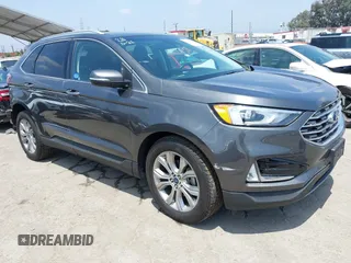 2019 Ford Edge Titanium z VIN 2FMPK3K95KBB22114, wystawiony jako IAAI lot #42432814 z przebiegiem 99 106 mil mil oraz . Historia ofert i sprzedaży dostępna na DreamBid. Obrazek 1.
