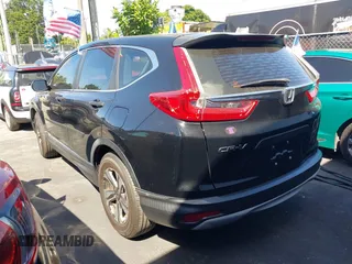 2017 Honda CR-V LX with VIN 7FARW5H30HE004035, listed as a IAAI auction lot 41836393 with 212,574 mi miles. Bid and sale history available at carsss.com. Image 3.