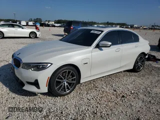 2022 BMW 3 Series 330e with VIN 3MW5P7J03N8C66082, listed as a Copart auction lot 50627595 with 70,799 mi miles and Salvage Title. Bid and sale history available at carsss.com. Image 1.