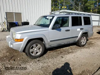 2006 Jeep Commander with VIN 1J8HH48N96C212639, listed as a Copart auction lot 73800324 with 140,579 mi miles and Salvage Title. Bid and sale history available at carsss.com. Image 1.