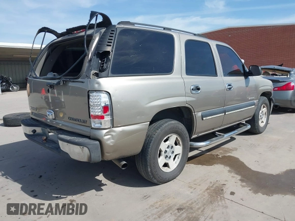 2003 Chevrolet Tahoe LS with VIN 1GNEC13V23R141539, listed as a IAAI auction lot 41812195 with 486,815 mi miles. Bid and sale history available at carsss.com. Image 4.