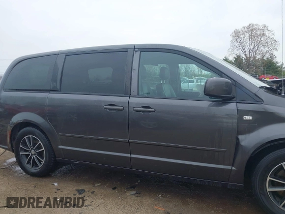2014 Dodge Grand Caravan SXT with VIN 2C4RDGCG0ER406080, listed as a IAAI auction lot 42023530 with 183,212 mi miles and . Bid and sale history available at DreamBid. Image 14.
