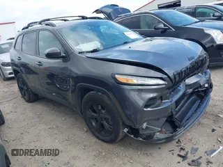 2016 Jeep Cherokee Latitude with VIN 1C4PJMCS7GW162716, listed as a IAAI auction lot 42309356 with 148,412 mi miles and . Bid and sale history available at DreamBid. Image 1.