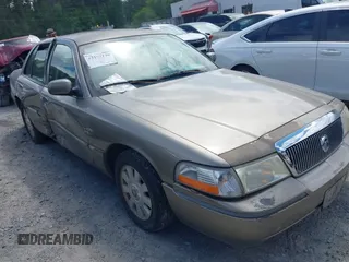 2003 Mercury Grand Marquis LS Premium z VIN 2MEFM75WX3X683205, wystawiony jako IAAI lot #42177139 z przebiegiem 200 521 mil mil oraz . Historia ofert i sprzedaży dostępna na DreamBid. Obrazek 1.