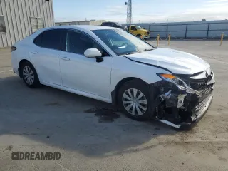 2022 Toyota Camry Hybrid LE with VIN 4T1C31AKXNU595736, listed as a Copart auction lot 50757815 with 44,231 mi miles and Salvage Title. Bid and sale history available at carsss.com. Image 4.