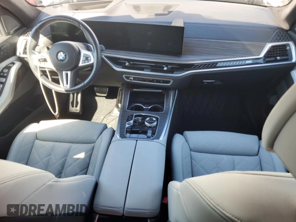 2023 BMW X7 M60i z VIN 5UX33EM07P9P54139, wystawiony jako Copart lot #74120224 z przebiegiem Nie podano mil oraz Szkoda całkowita • Salvage title. Historia ofert i sprzedaży dostępna na DreamBid. Obrazek 8.