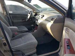 2004 Toyota Corolla CE with VIN 1NXBR38E44Z303812, listed as a IAAI auction lot 41879002 with 299,999 mi miles and . Bid and sale history available at DreamBid. Image 5.