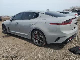2020 Kia Stinger GT2 with VIN KNAE55LC4L6072117, listed as a Copart auction lot 49027215 with 64,397 mi miles and Salvage Title. Bid and sale history available at carsss.com. Image 2.