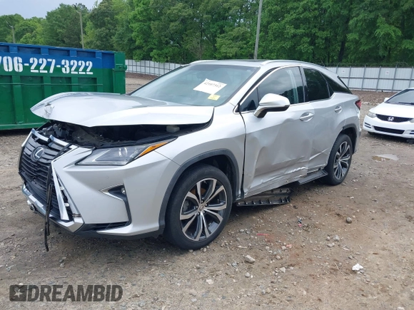 2016 Lexus RX 350 z VIN 2T2ZZMCA5GC002315, wystawiony jako IAAI lot #42107312 z przebiegiem 156 339 mil mil oraz . Historia ofert i sprzedaży dostępna na DreamBid. Obrazek 19.