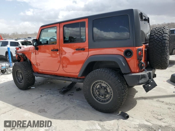 2015 Jeep Wrangler Unlimited Rubicon with VIN 1C4BJWFG9FL654550, listed as a Copart auction lot 49306965 with 64,911 mi miles and Salvage Title. Bid and sale history available at carsss.com. Image 2.