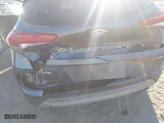 2018 Hyundai Tucson Value with VIN KM8J3CA2XJU776526, listed as a IAAI auction lot 41322657 with 102,444 mi miles. Bid and sale history available at carsss.com. Image 6.