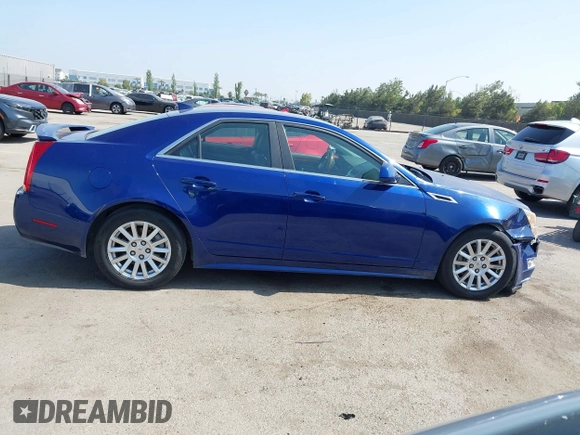 2012 Cadillac CTS Luxury with VIN 1G6DE5E59C0102621, listed as a IAAI auction lot 42554121 with 128,430 mi miles and . Bid and sale history available at DreamBid. Image 13.