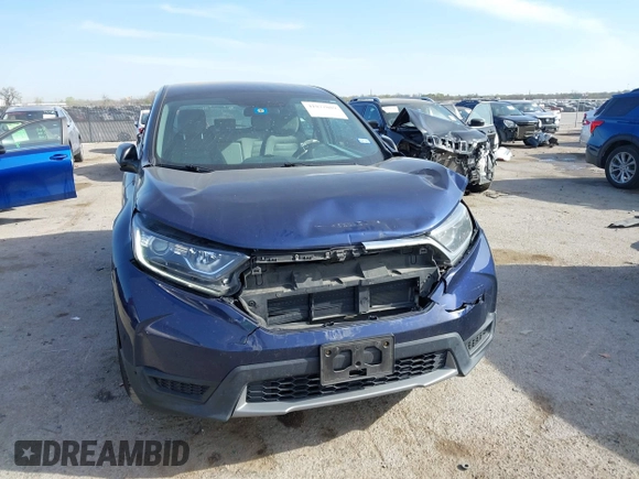 2019 Honda CR-V LX with VIN 5J6RW5H32KL003561, listed as a IAAI auction lot 41872089 with 65,146 mi miles and . Bid and sale history available at carsss.com. Image 6.