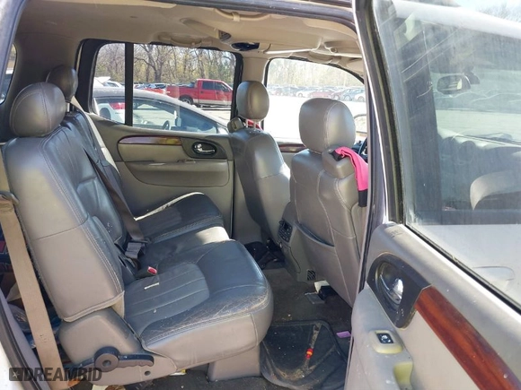 2003 GMC Envoy XL SLT with VIN 1GKET16S136145209, listed as a IAAI auction lot 40862083 with 244,923 mi miles. Bid and sale history available at carsss.com. Image 8.