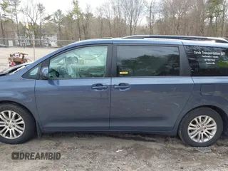 2014 Toyota Sienna XLE with VIN 5TDYK3DC9ES511035, listed as a IAAI auction lot 41884115 with 153,071 mi miles. Bid and sale history available at carsss.com. Image 15.