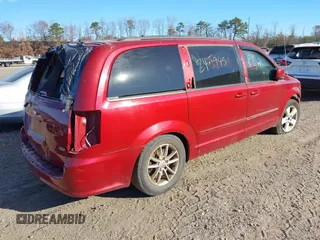 2015 Dodge Grand Caravan SE with VIN 2C4RDGBG8FR709045, listed as a IAAI auction lot 40899464 with Not Provided miles and . Bid and sale history available at DreamBid. Image 4.