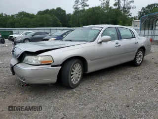 2003 Lincoln Town Car Executive z VIN 1LNHM81W93Y630917, wystawiony jako Copart lot #58377215 z przebiegiem 202 486 mil mil oraz Szkoda całkowita • Salvage title. Historia ofert i sprzedaży dostępna na DreamBid. Obrazek 1.