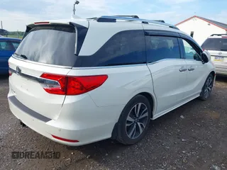 2018 Honda Odyssey Elite with VIN 5FNRL6H98JB045078, listed as a IAAI auction lot 42184758 with 144,981 mi miles. Bid and sale history available at carsss.com. Image 4.