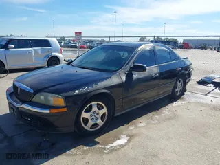 2000 Lincoln LS with VIN 1LNHM86S4YY818127, listed as a IAAI auction lot 41329978 with 158,134 mi miles. Bid and sale history available at carsss.com. Image 18.