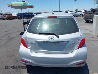 2012 Toyota Yaris L z VIN JTDKTUD3XCD533644, wystawiony jako IAAI lot #42286777 z przebiegiem 149 185 mil mil oraz . Historia ofert i sprzedaży dostępna na DreamBid. Obrazek 13.