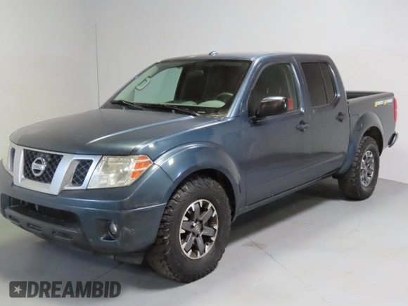 2014 Nissan Frontier SV with VIN 1N6AD0ERXEN763554, listed as a Copart auction lot 64313295 with 109,756 mi miles and Salvage title. Bid and sale history available at DreamBid. Image 2.