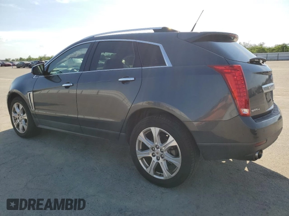 2013 Cadillac SRX Performance Collection with VIN 3GYFNHE36DS582725, listed as a Copart auction lot 50722535 with 137,164 mi miles and Salvage Title. Bid and sale history available at carsss.com. Image 2.