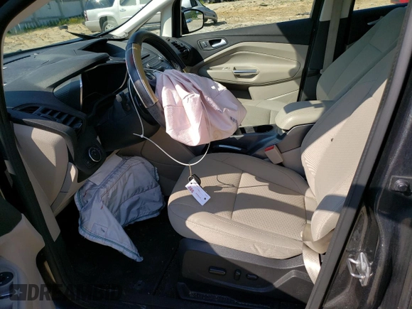 2017 Ford C-Max Energi SE with VIN 1FADP5EUXHL108664, listed as a Copart auction lot 63443913 with 104,634 mi miles. Bid and sale history available at carsss.com. Image 7.