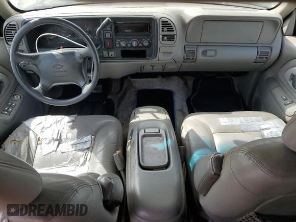 1997 Chevrolet Suburban z VIN 1GNFK16R9VJ309720, wystawiony jako Copart lot #48814475 z przebiegiem 198 109 mil mil oraz Czysty tytuł • Clean title. Historia ofert i sprzedaży dostępna na DreamBid. Obrazek 8.