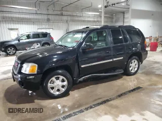 2003 GMC Envoy SLT with VIN 1GKDT13S232251871, listed as a Copart auction lot 45306785 with 174,303 mi miles and Salvage Title. Bid and sale history available at carsss.com. Image 1.